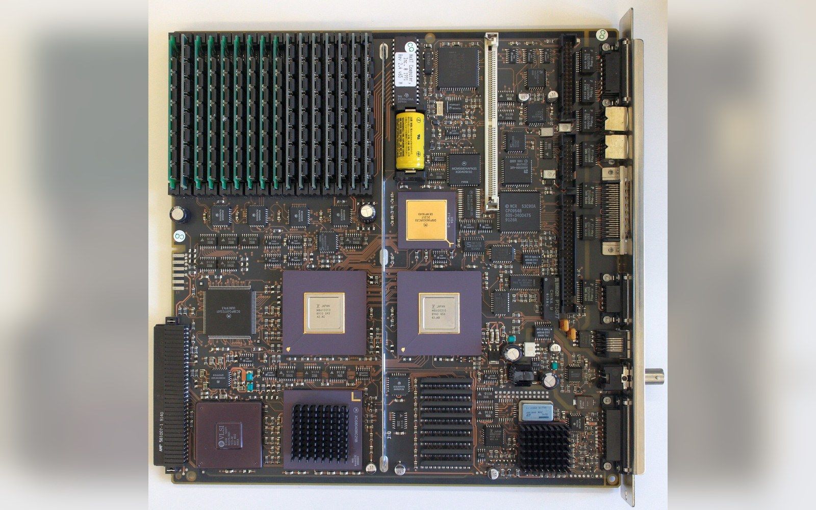 A NeXTcube motherboard with dual processors, memory slots, and multiple chips mounted on a circuit board